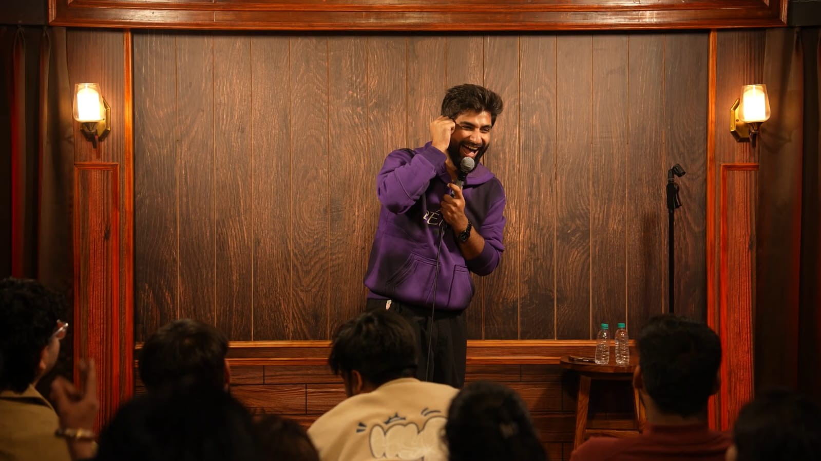 Audience enjoying live stand-up comedy at Highlane Comedy Club